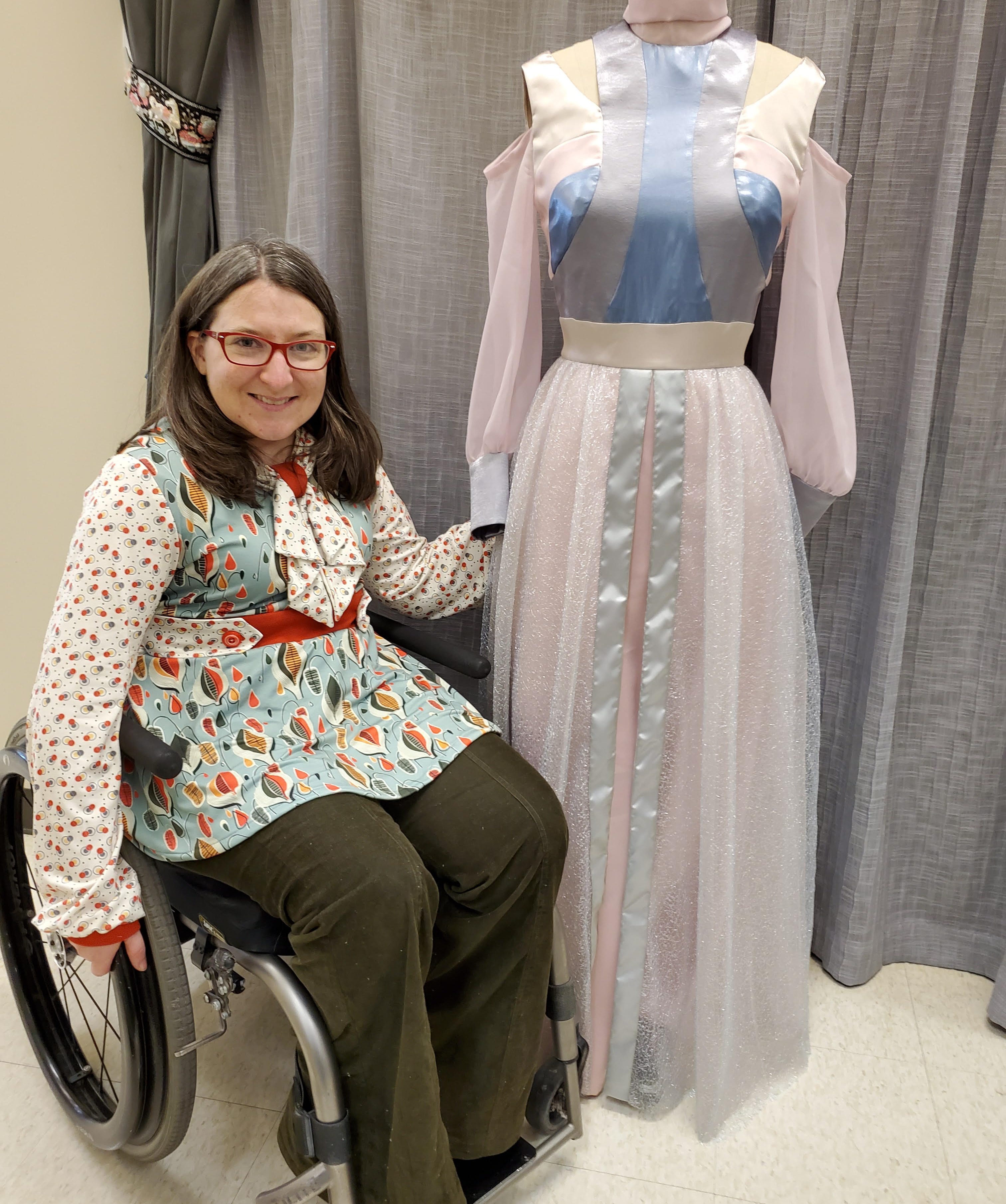 snapshot of Sarah LeFeber with one of her costume creations